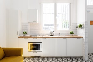 Loft conforto | Cozinha privada | Geladeira grande, micro-ondas, cooktop, cafeteira/chaleira