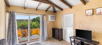 Caribbean View Style 1 Bedroom Condo by RedAwning