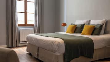 Habitación Deluxe | 1 habitación, ropa de cama de alta calidad y decoración personalizada