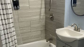 Hair dryer, towels, soap, shampoo