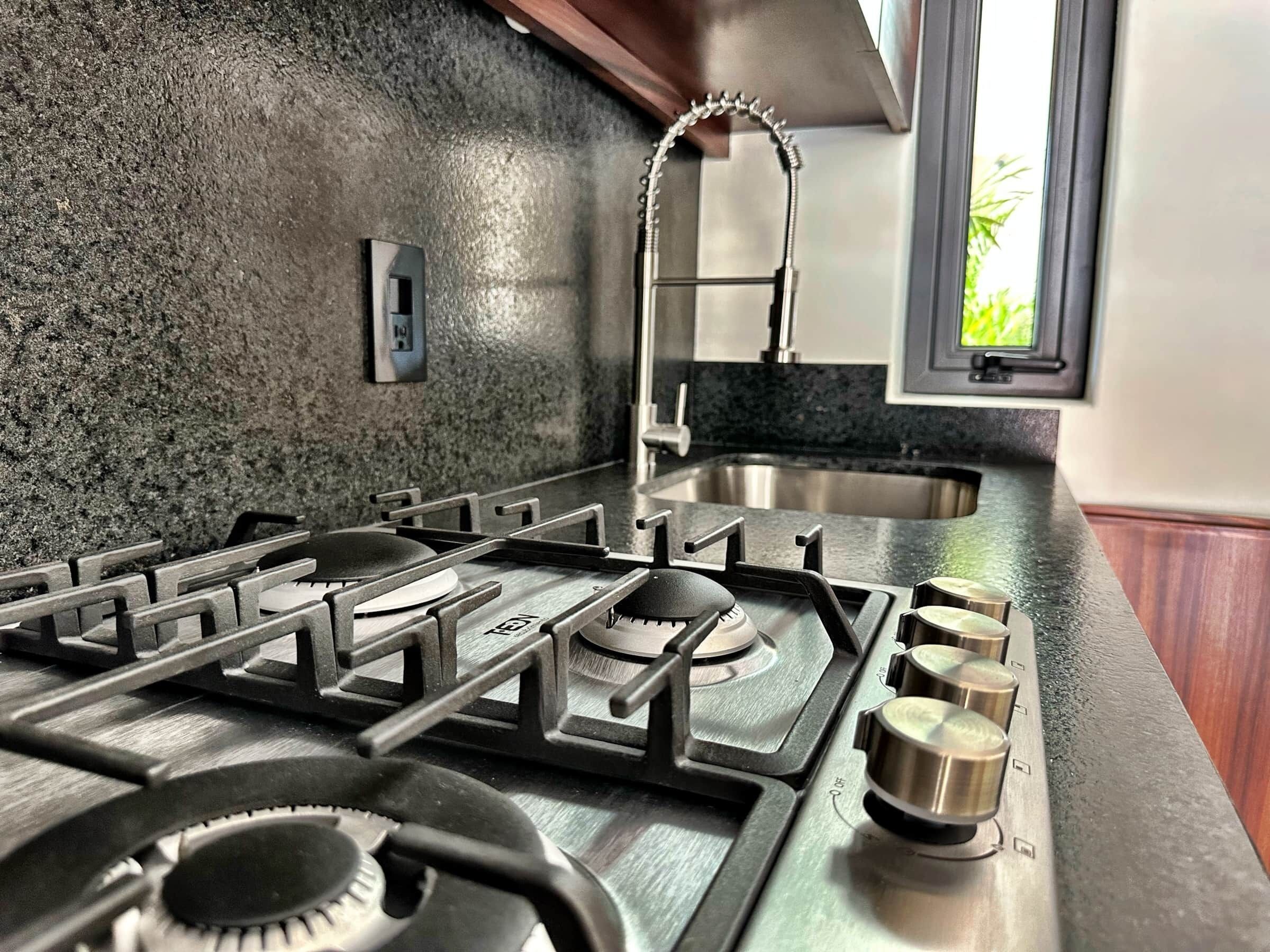Fridge, microwave, stovetop, coffee/tea maker