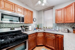 Fridge, microwave, oven, stovetop - McKinley Heights Duplex: By StayStLouis (St. Louis)