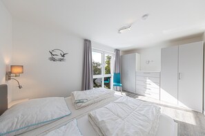 Room - Ferienhaus Nordsee-koje mit Meerblick, Strandkorb, Kamin, Sauna (Wangerland)