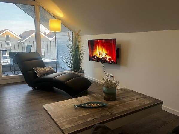 Interior - Ferienhaus Nordsee-koje mit Meerblick, Strandkorb, Kamin, Sauna (Wangerland)