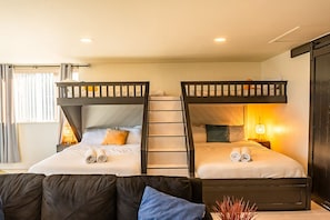 4 bedrooms, desk, iron/ironing board, travel cot