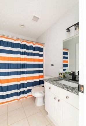 Hair dryer, towels, soap, shampoo