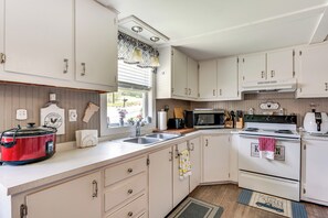 Microwave, coffee/tea maker, toaster, cookware/dishes/utensils