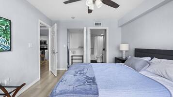 1 bedroom, desk, iron/ironing board, travel crib