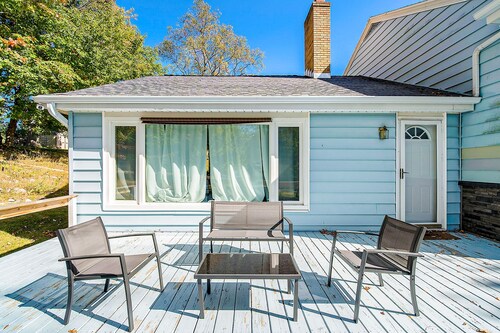 Comfortable home in a great location with enclosed yard, family room, & kayaks