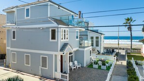 A two-story house with a balcony overlooking the beach. - The Mission Beach VIP- Luxury Home, 3 Private Decks, 30 steps to the Beach!  (San Diego)