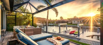 Waterfront house with private pool, dock, bikes, firepit, kayak & lanai