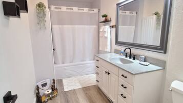 Hair dryer, towels, soap, shampoo