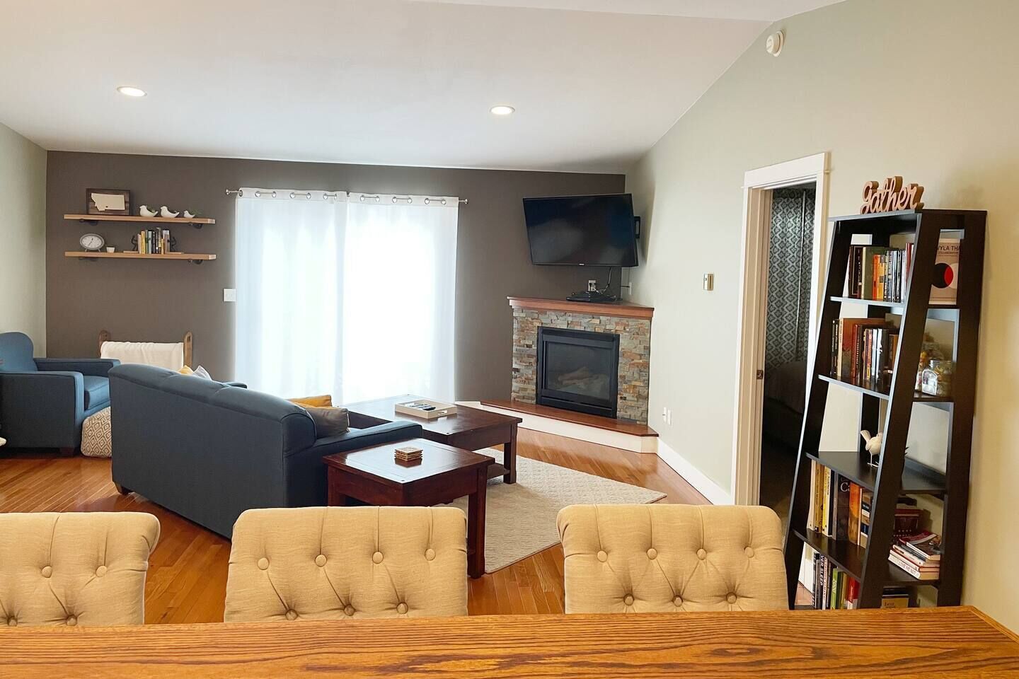 Smart TV, fireplace, DVD player, books