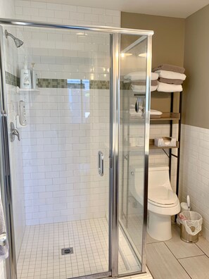 Shower, hair dryer, towels, soap