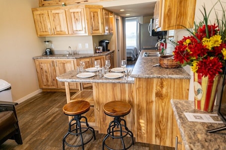 Fridge, microwave, oven, stovetop. Modern Tiny Cabin on 550-acre Ranch, ATV, & Safari.