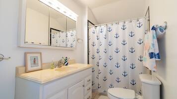 Hair dryer, towels, soap, shampoo