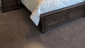 A bedroom with a large bed, two nightstands, a wooden headboard, and a window with blinds. - 3-bedroom condo in pleasant Mesquite with AC, WiFi. Enjoy your stay (Mesquite)