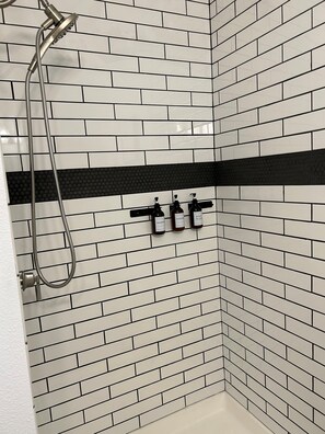 Shower, hair dryer, towels, soap