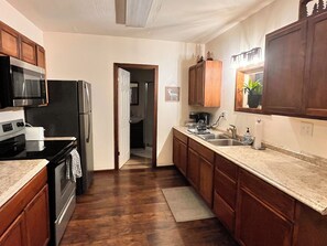 Fridge, microwave, oven, stovetop - Apartment - River Access/Minutes to Glacier Park! (Hungry Horse)
