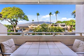 Outdoor dining - Kihei Holiday 215 - a Charming 2BR, 1BA Condo with AC, Ocean View, and More! (Kihei)