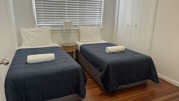 4 bedrooms, desk, iron/ironing board, travel crib