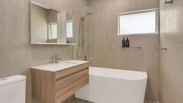 Shower, hair dryer, towels, soap