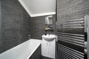 Hair dryer, towels, soap, shampoo