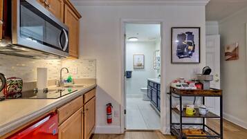 Fridge, microwave, stovetop, coffee/tea maker