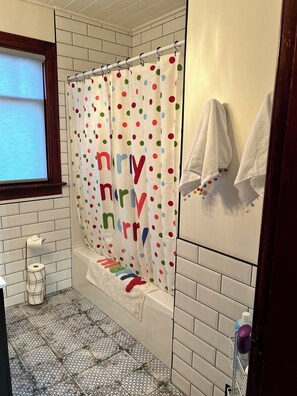 Shower, hair dryer, towels, soap