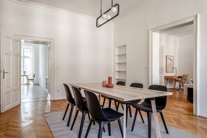 Enjoy meals in this stylish dining area with a large table and comfortable seating for six.
