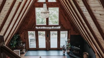 Smart TV, fireplace, table football, books