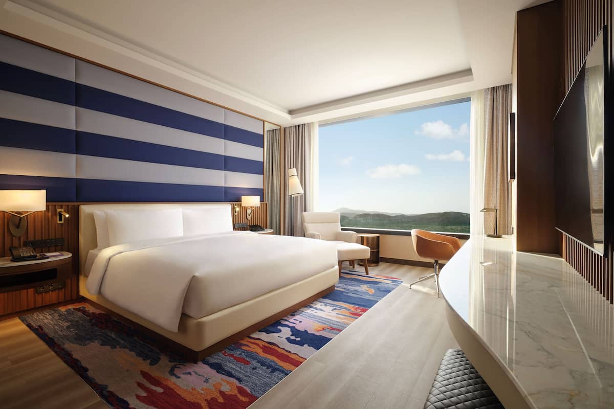 Daunenbettdecken, Minibar, Zimmersafe, Verdunkelungsvorhänge