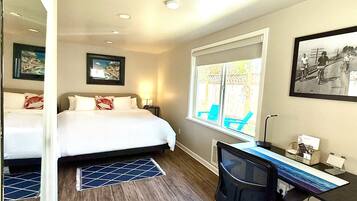 1 bedroom, desk, iron/ironing board, travel crib