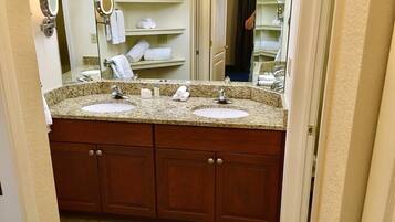 Hair dryer, towels, soap, toilet paper