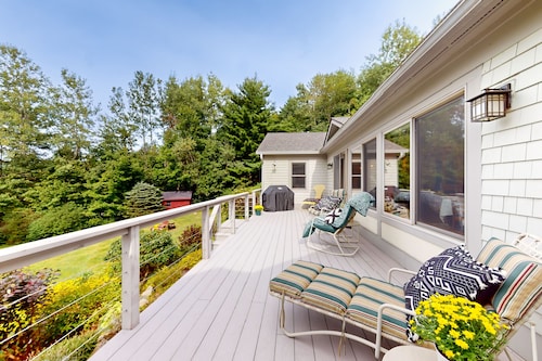 Luxe custom home with hot tub, game room, & beautiful garden