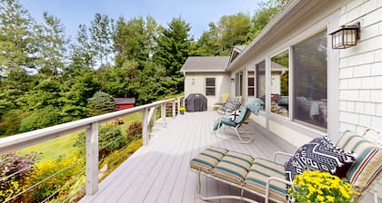 Luxe custom home with hot tub, game room, & beautiful garden