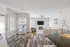 Smart TV, fireplace, books, printers