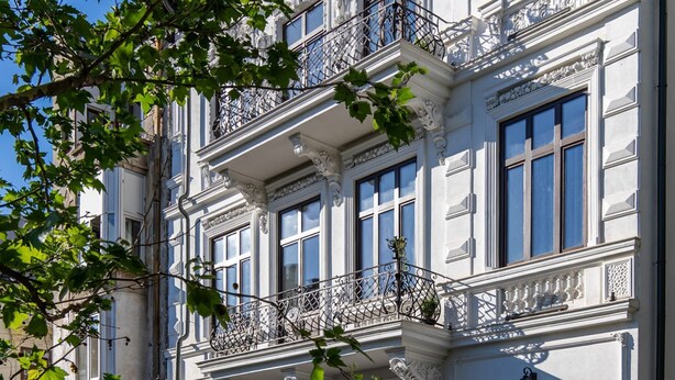A historic building with ornate balconies and large windows. - Holt Old Town One Bedroom Apartments (Bucharest)
