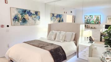 1 bedroom, desk, iron/ironing board, travel crib