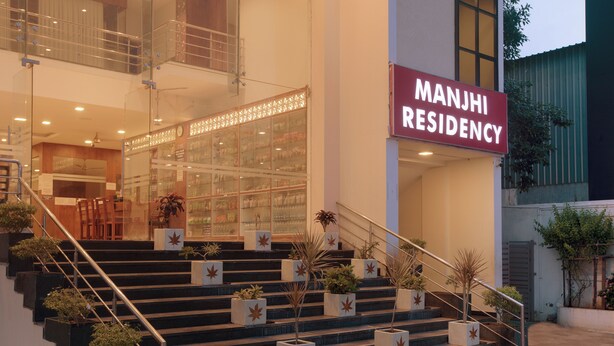 A building entrance with a sign reading "MANUJI RESIDENCY". - Manjhi Residency  (Tiruchirappalli)