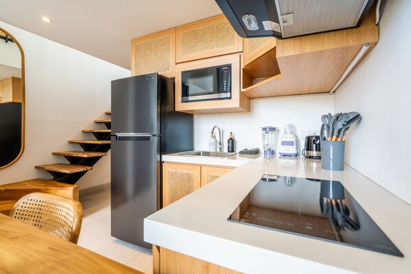 Appartement Supérieur | Coin cuisine privé | Réfrigérateur, micro-ondes, plaque de cuisson, grille-pain