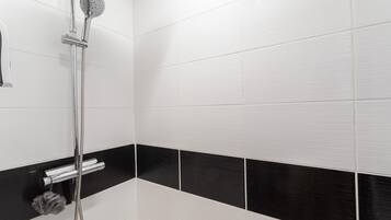 Shower, free toiletries, hair dryer, towels