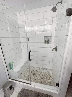 Shower, hair dryer, towels