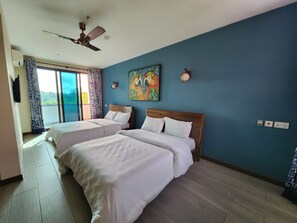 Habitación Deluxe con 2 camas individuales, 2 camas dobles, vistas al jardín, en la zona del jardín | Ropa de cama de alta calidad, edredones de plumas, wifi gratis
