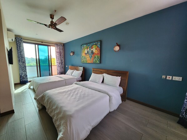 Deluxe-Zweibettzimmer, 2 Doppelbetten, Gartenblick, zum Garten hin | Hochwertige Bettwaren, Daunenbettdecken, kostenloses WLAN, Bettwäsche