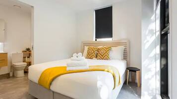 2 عدّة غرف نوم ومكواة/لوح كي وواي فاي مجانًا