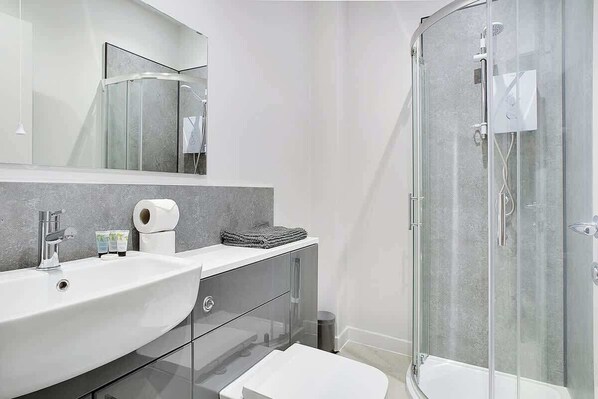 Shower, hair dryer, shampoo