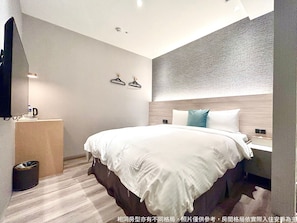 Habitación económica doble | Edredones de plumas, wifi gratis, ropa de cama