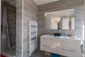 Shower, hair dryer, towels, soap