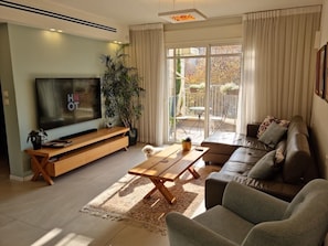 Living area - Beautiful rooftop duplex with a balcony overlooking the park (Modi'in-Maccabim-Re'ut)